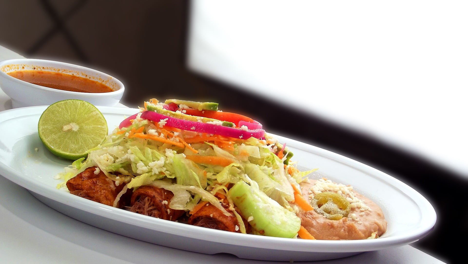 Spicy Sweet Potato and Black Bean Enchiladas