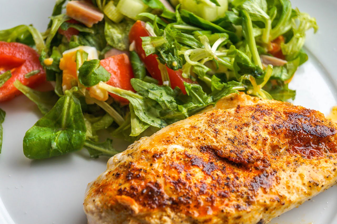 chicken dish and salad