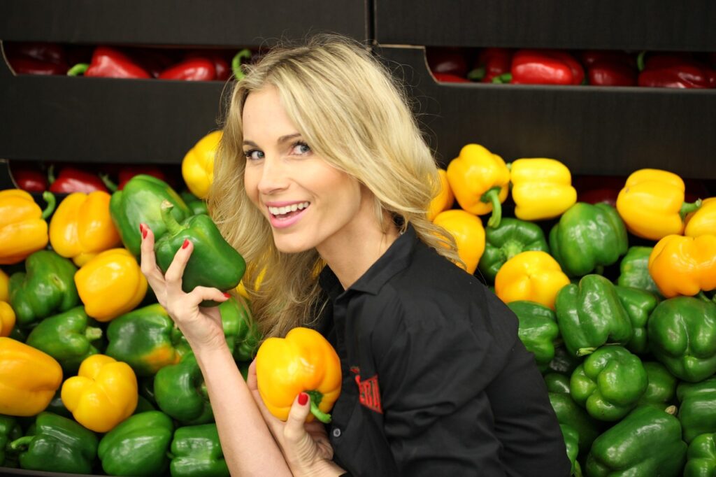 Woman Selecting Fresh Fruit in Grocery Store
